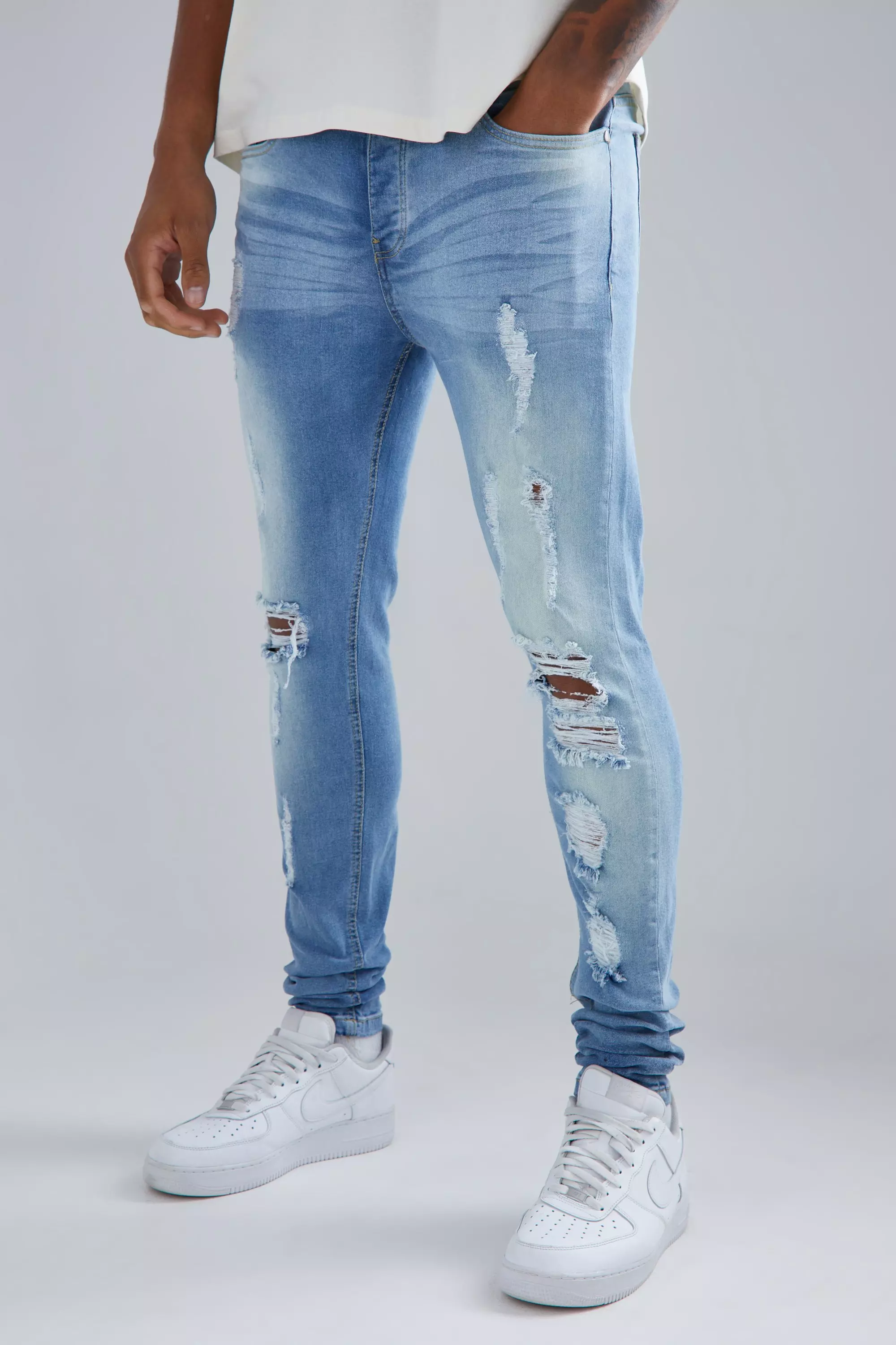 Ripped and store repaired jeans womens